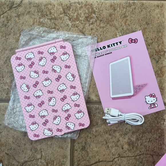 NIB Impressions Hello Kitty *Bundle* Mirror and Makeup Sponge set. - Picture 2 of 13
